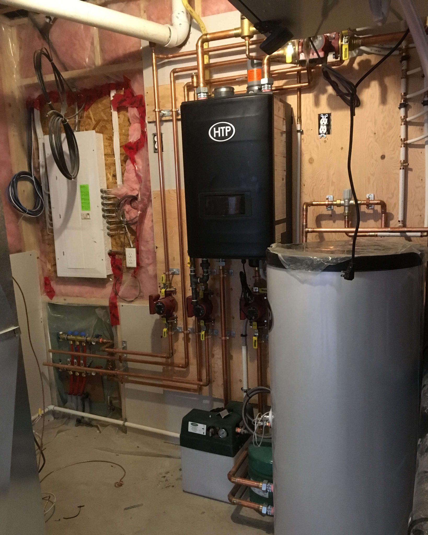 Maintaining Boilers for Optimal Performance in Canmore Boiler system receiving maintenance in an Canmore customer's home, ensuring reliable heating.