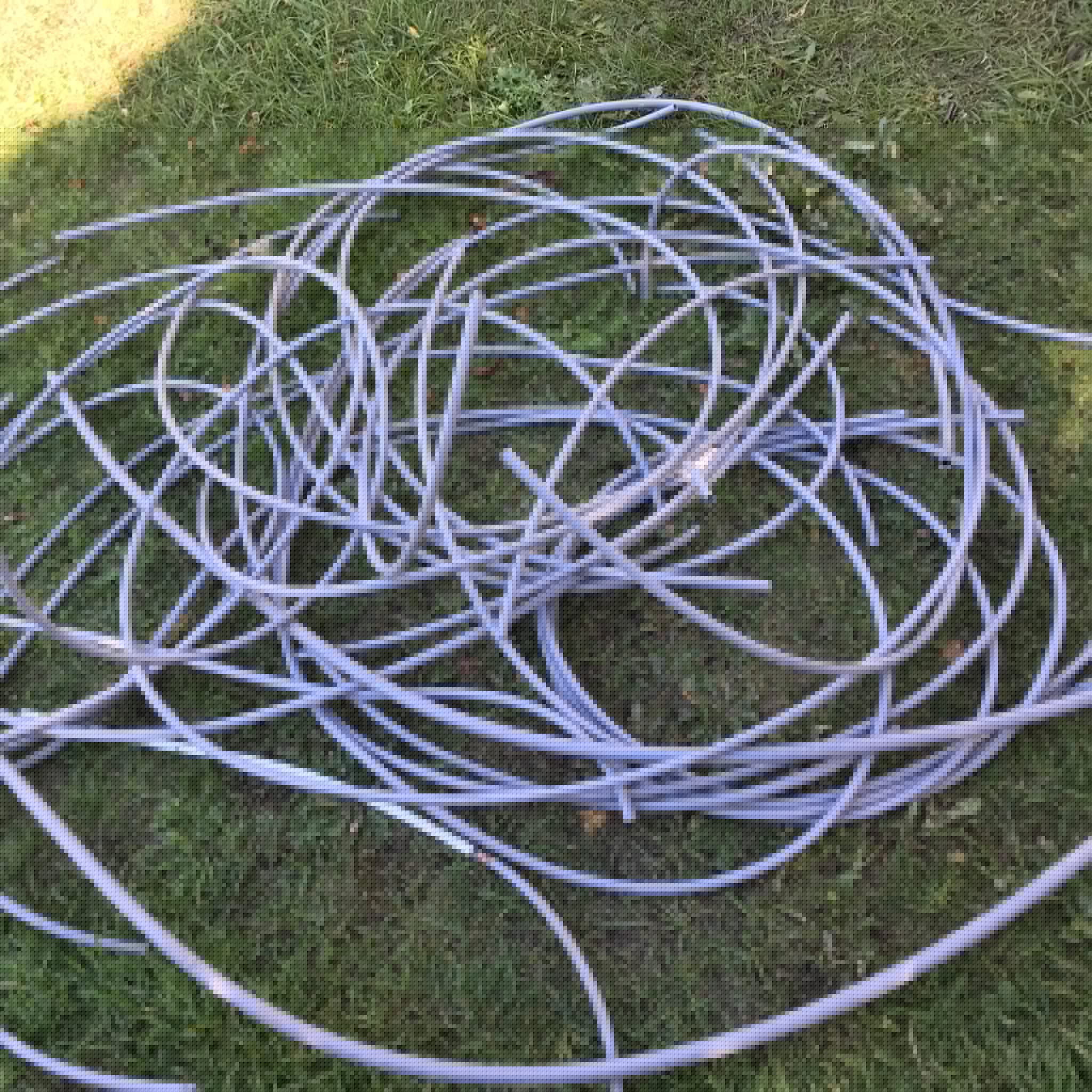 Pile of removed Poly B pipes from an Canmore, indicating extensive repiping work.