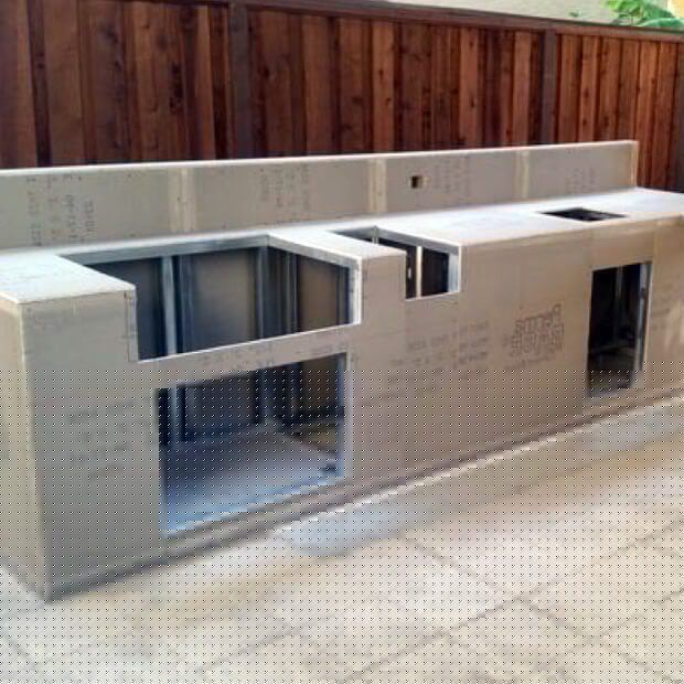 Bespoke outdoor kitchen in Edmonton, designed for exceptional alfresco dining and entertaining.
