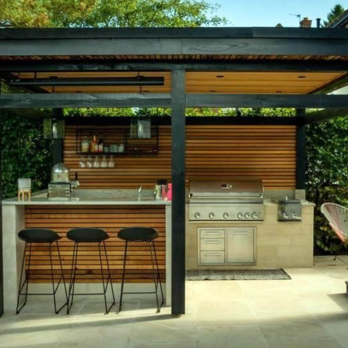 Luxurious outdoor kitchen in Calgary, merging culinary art with outdoor elegance.