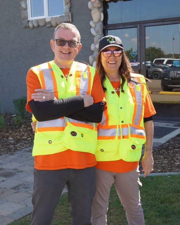 Darren and Tina taking part in a community event in Edmonton, representing Kingstree Plumbing and their Faucet Replacement & Installation services.
