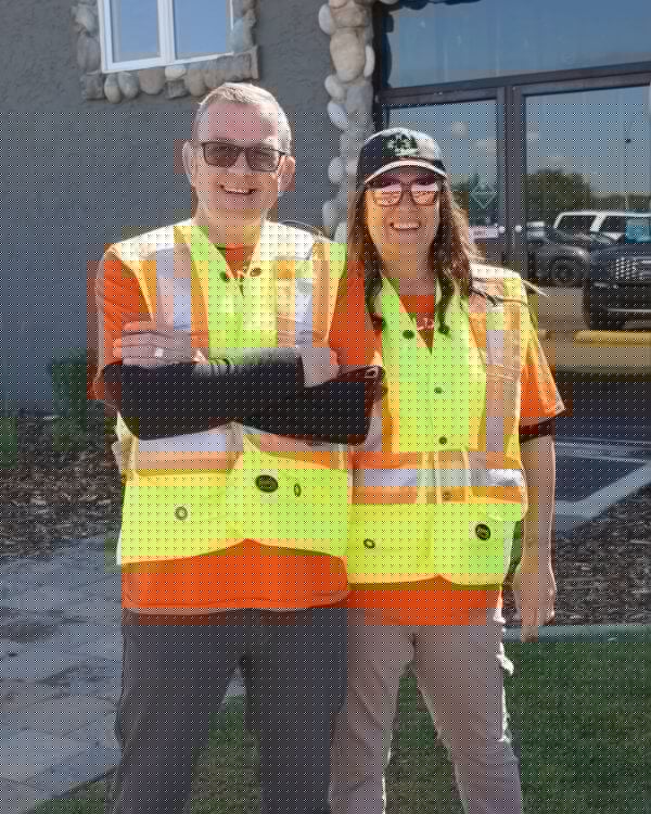 Kingstree Plumbing owners Darren and Tina at an Ardrossan community event, supporting the area through AC Repair & Maintenance services.